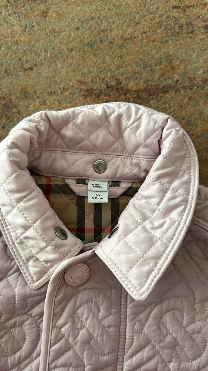 Dress your little fashionista in luxury with the Stylish Burberry Jacket with Detachable Hood - iconic style for every precious moment!