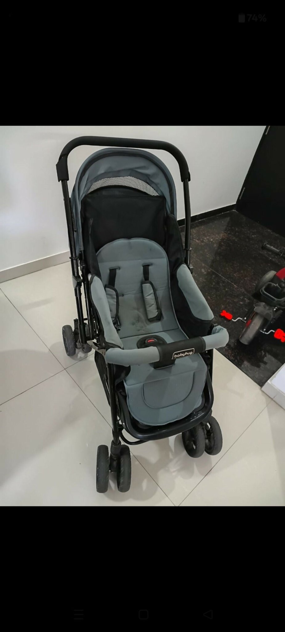 Babyhug Symphony stroller with reclining seat, smooth wheels, safety harness, adjustable canopy, and comfortable travel design for babies and toddlers.