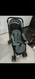 Babyhug Symphony stroller with reclining seat, smooth wheels, safety harness, adjustable canopy, and comfortable travel design for babies and toddlers.