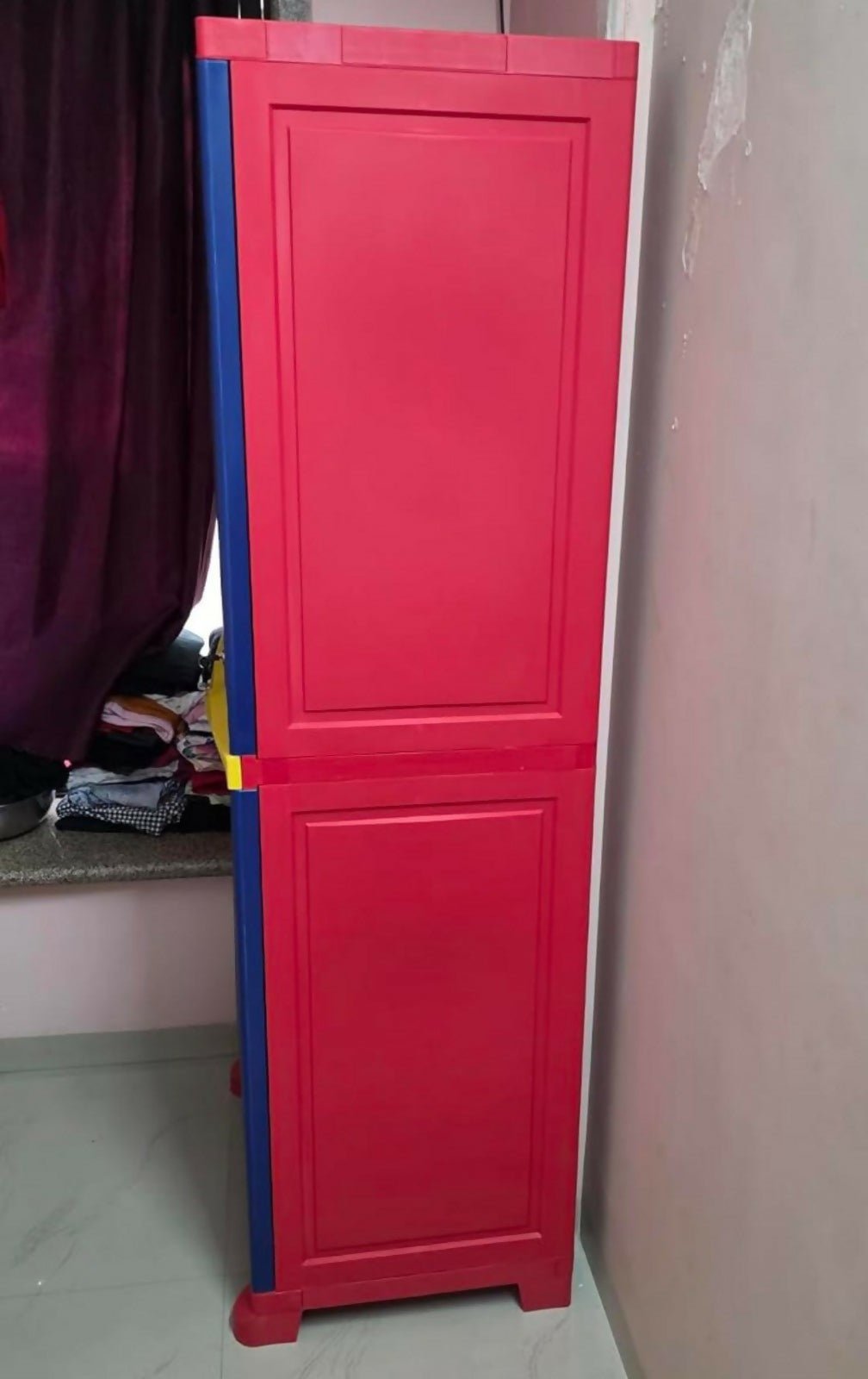 NILKAMAL 4-shelf storage cupboard with spacious shelves, durable construction, and an organized storage solution for toys, clothes, books, and household essentials.
