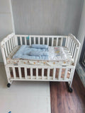 Multifunctional wooden baby cot