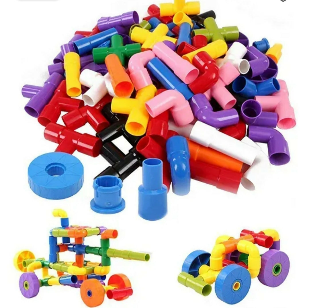 Colorful plastic building blocks with assembled models