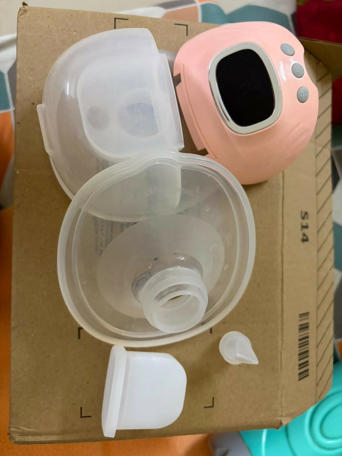 PROMOM Wearable Electric Breast Pump featuring a compact hands-free design, adjustable pumping settings and comfortable fit for convenient breast milk expression at home, work or while travelling.