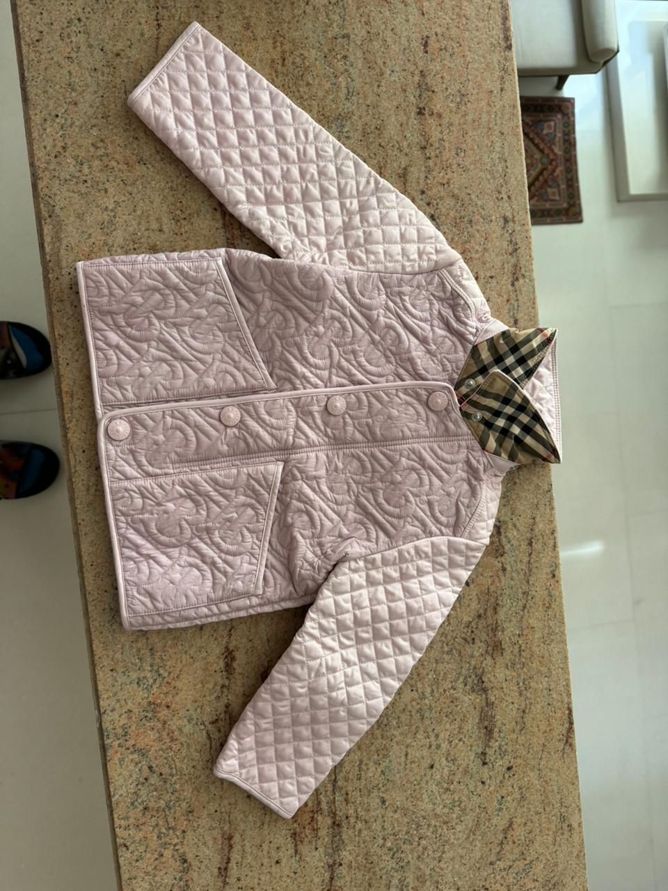 Dress your little fashionista in luxury with the Stylish Burberry Jacket with Detachable Hood - iconic style for every precious moment!