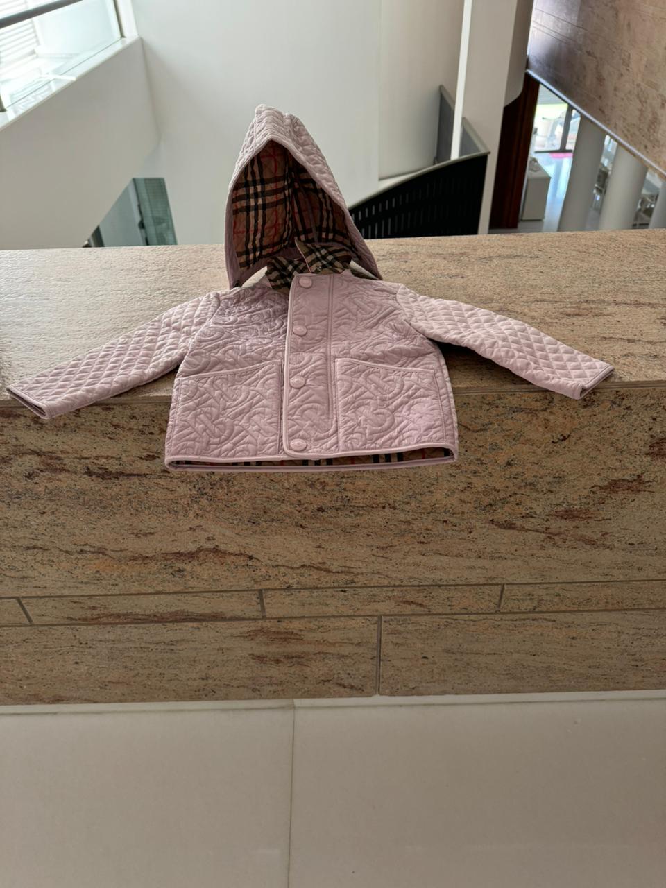 Dress your little fashionista in luxury with the Stylish Burberry Jacket with Detachable Hood - iconic style for every precious moment!