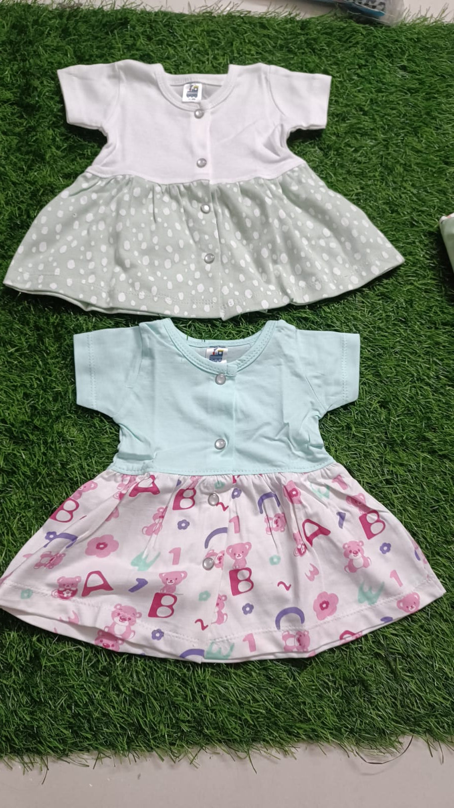 Set of 2 Baby Girl Frocks/Dresses, crafted from soft, breathable fabric with charming designs for comfort and style on any occasion.