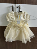 Yellow dress with a tag
