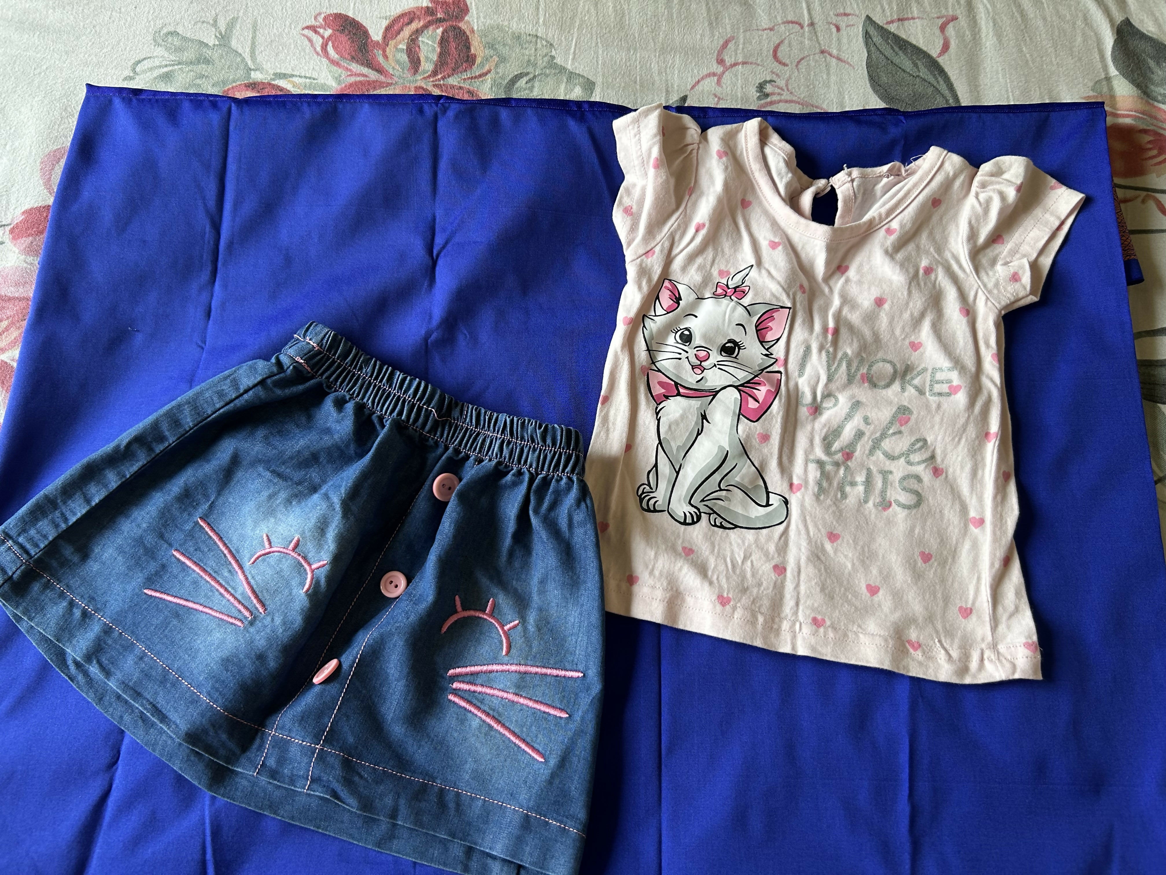Children's denim shorts and white shirt with cartoon design