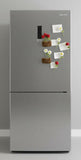Stainless steel refrigerator with decorative magnets