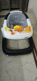 BAYBEE Astro 2-in-1 baby walker – convertible seated & push walker with music, height adjustment & safety features.