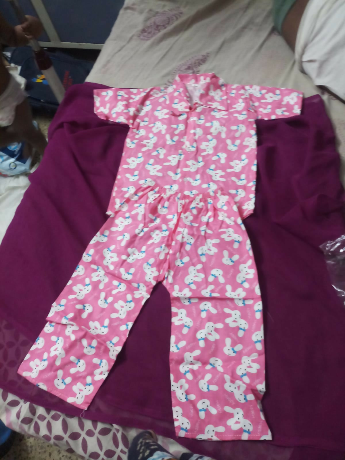 Buy Newborn Baby Clothing Combo – 9-piece set with cotton suits, velvet jumpsuit, woolen shawl & more for cozy all-season comfort.