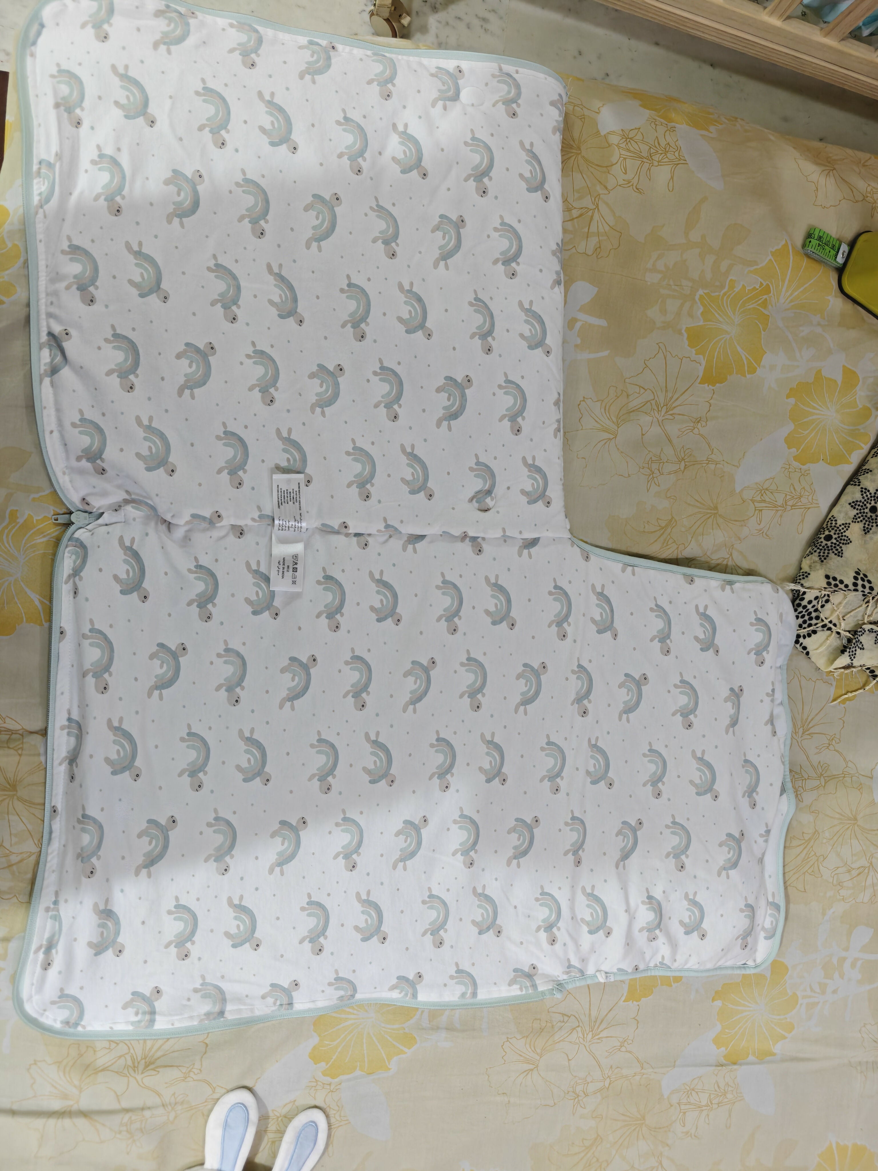 Textured fabric with a pattern on a floral bedspread