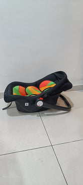 Black car seat with colorful design