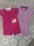 Set of 2 Rompers for baby girls, featuring soft, breathable fabric and easy snap closures for comfort and convenience.