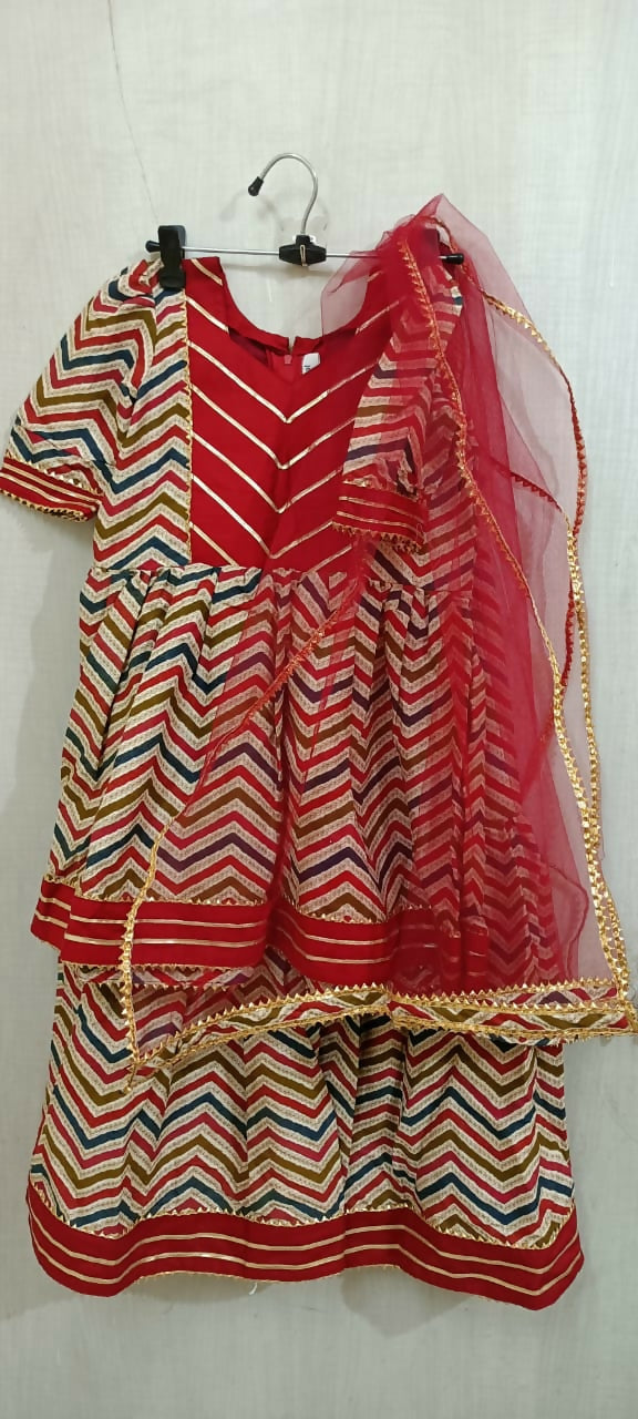 Elevate your baby girl's style with the captivating combination of red and skin color - a perfect blend of vibrancy and warmth for her adorable wardrobe