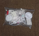 Packaged electronic components on a brown surface