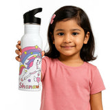 Child holding a white water bottle with a unicorn design and 'Shanavi' text.