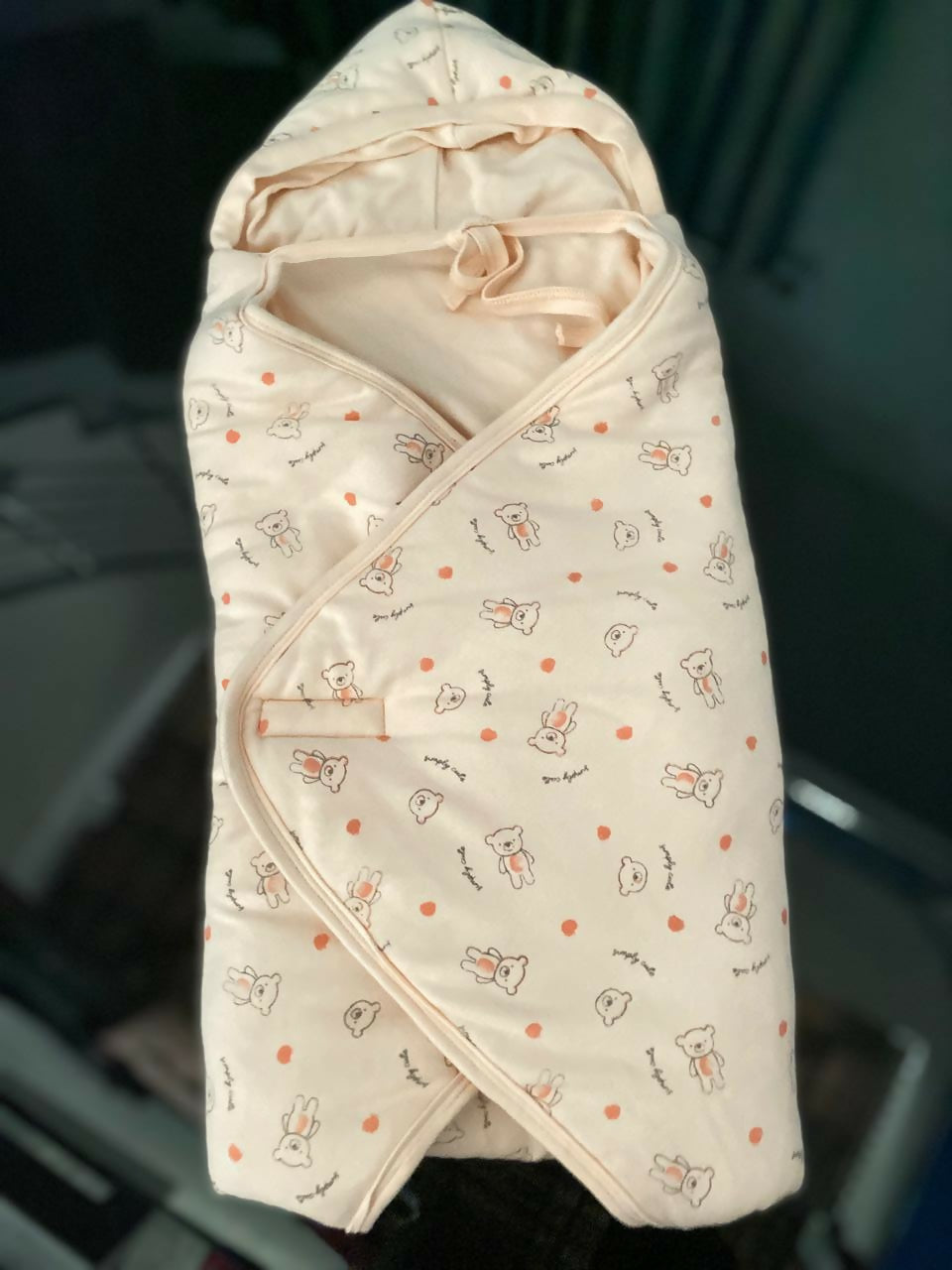 Baby romper with cartoon pattern on a dark background