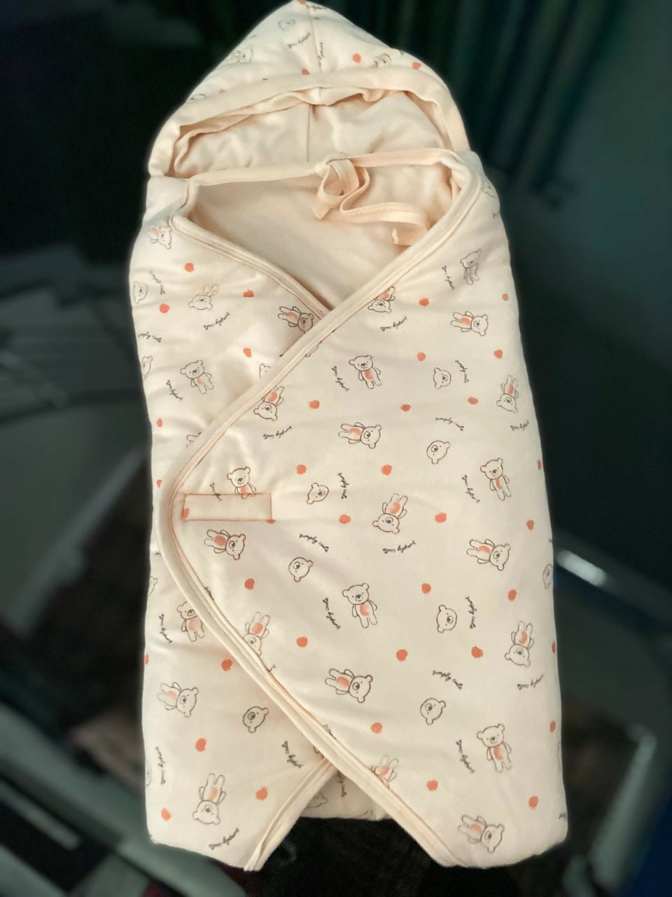 Baby romper with cartoon pattern on a dark background