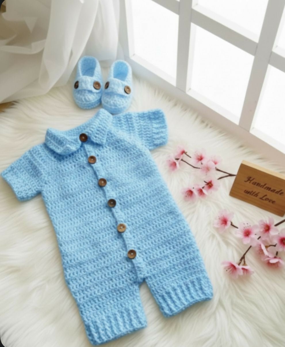 Blue crochet baby romper with matching booties