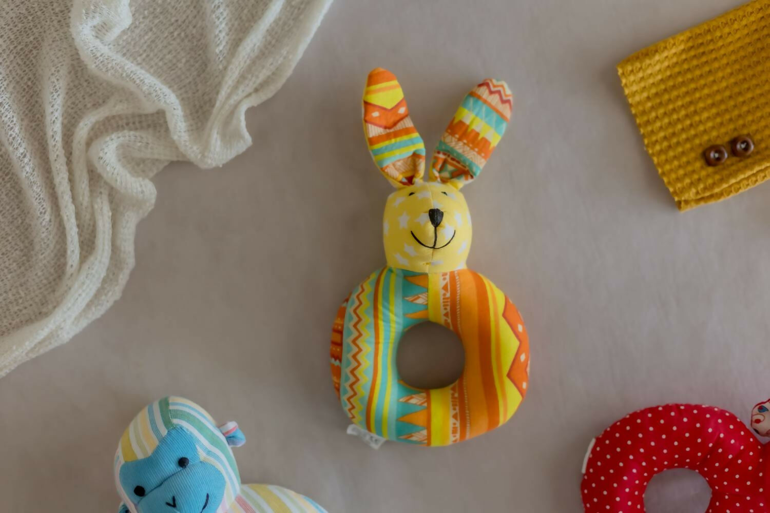 Introducing our Kangroo Faced Shape Rattle, a delightful and eco-conscious sensory toy crafted with care and consideration.
