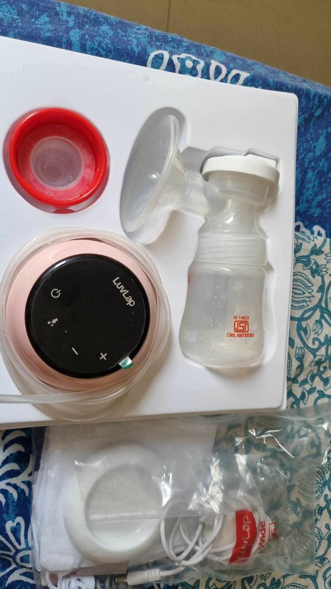 Electric breast pump with accessories
