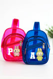 Pink and blue transparent mini backpacks with cartoon characters on a white background