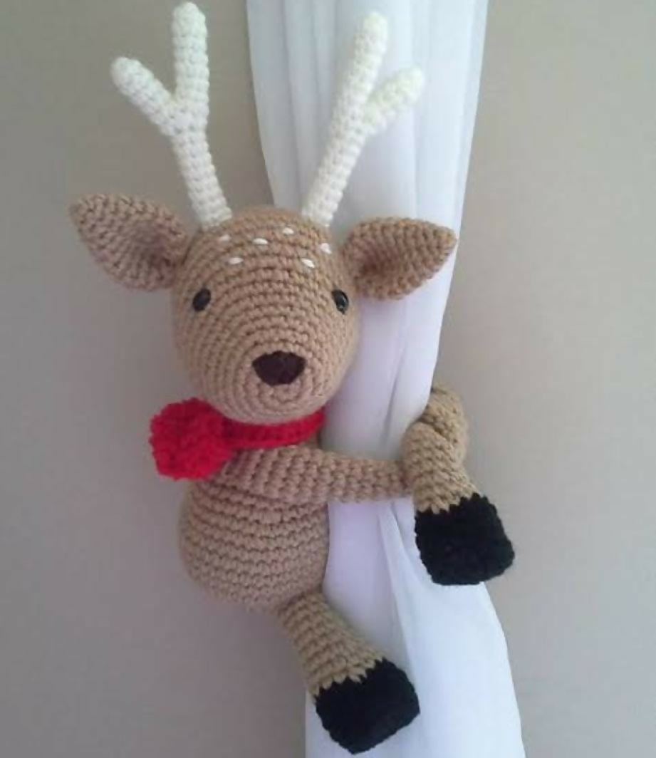 Adorable and functional curtain holders for baby rooms, designed to keep curtains neatly tied while adding a playful touch to nursery decor.