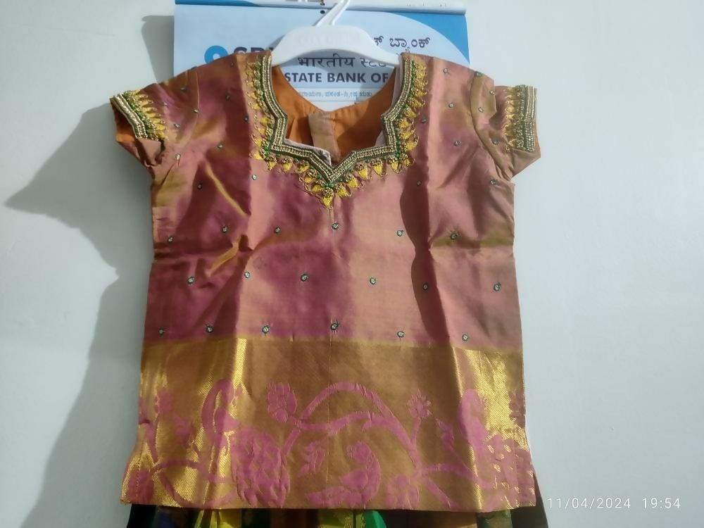 Dress your little girl in luxury and elegance with our Silk Lehenga and Blouse set, perfect for special occasions and celebrations.