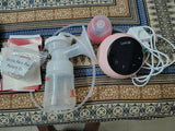 Pink breast pump