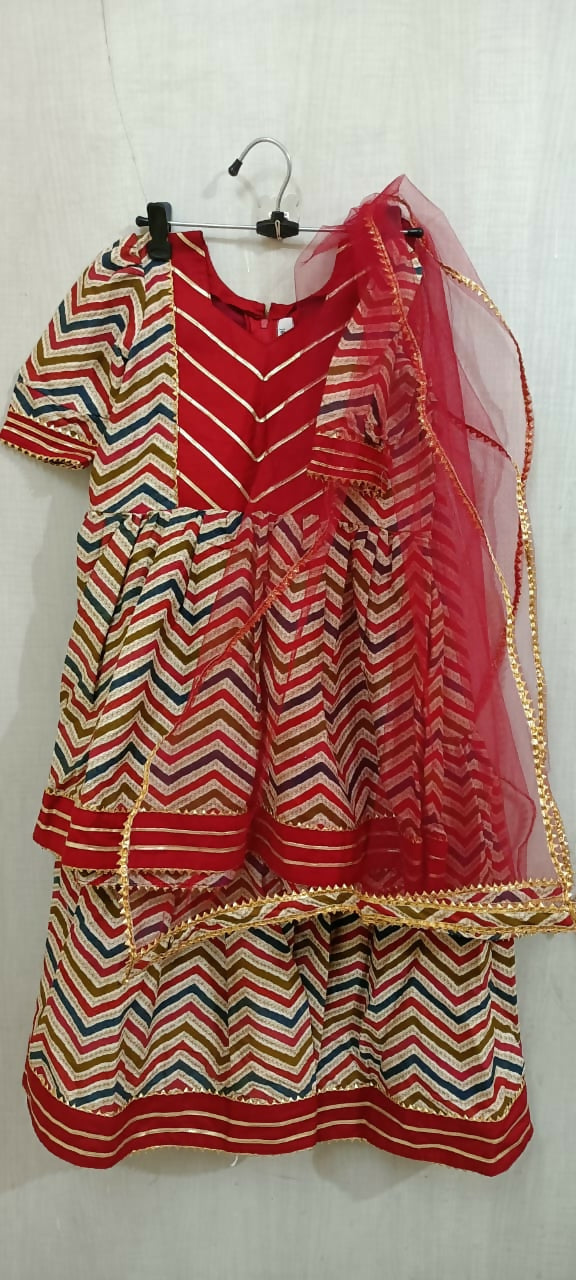 Elevate your baby girl's style with the captivating combination of red and skin color - a perfect blend of vibrancy and warmth for her adorable wardrobe