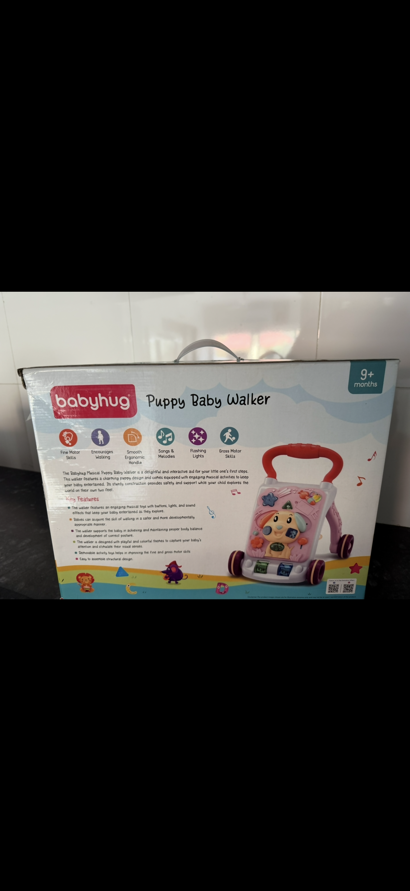 Box of baby walker with colorful design and text on a white background