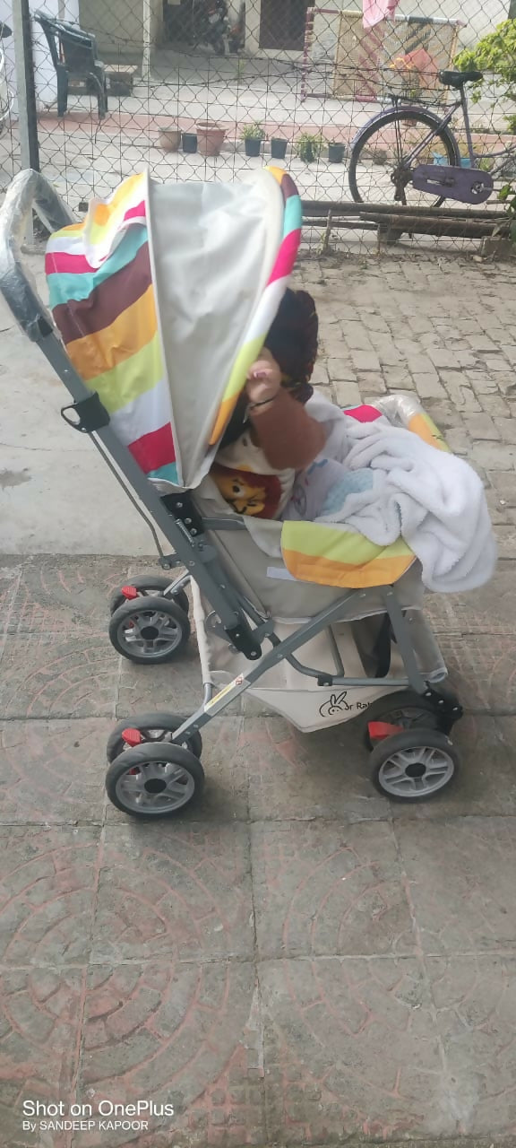 Stroller with a colorful canopy
