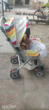 Stroller with a colorful canopy