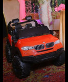 Stylish red battery ride-on car for kids – safe, fun, and perfect for little drivers.