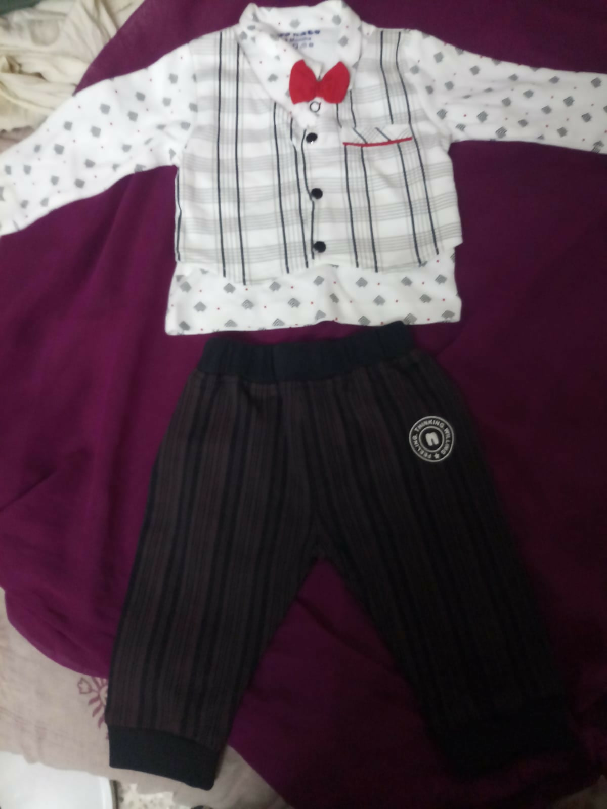 Buy Newborn Baby Clothing Combo – 9-piece set with cotton suits, velvet jumpsuit, woolen shawl & more for cozy all-season comfort.