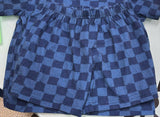 Blue checkered fabric on a white background