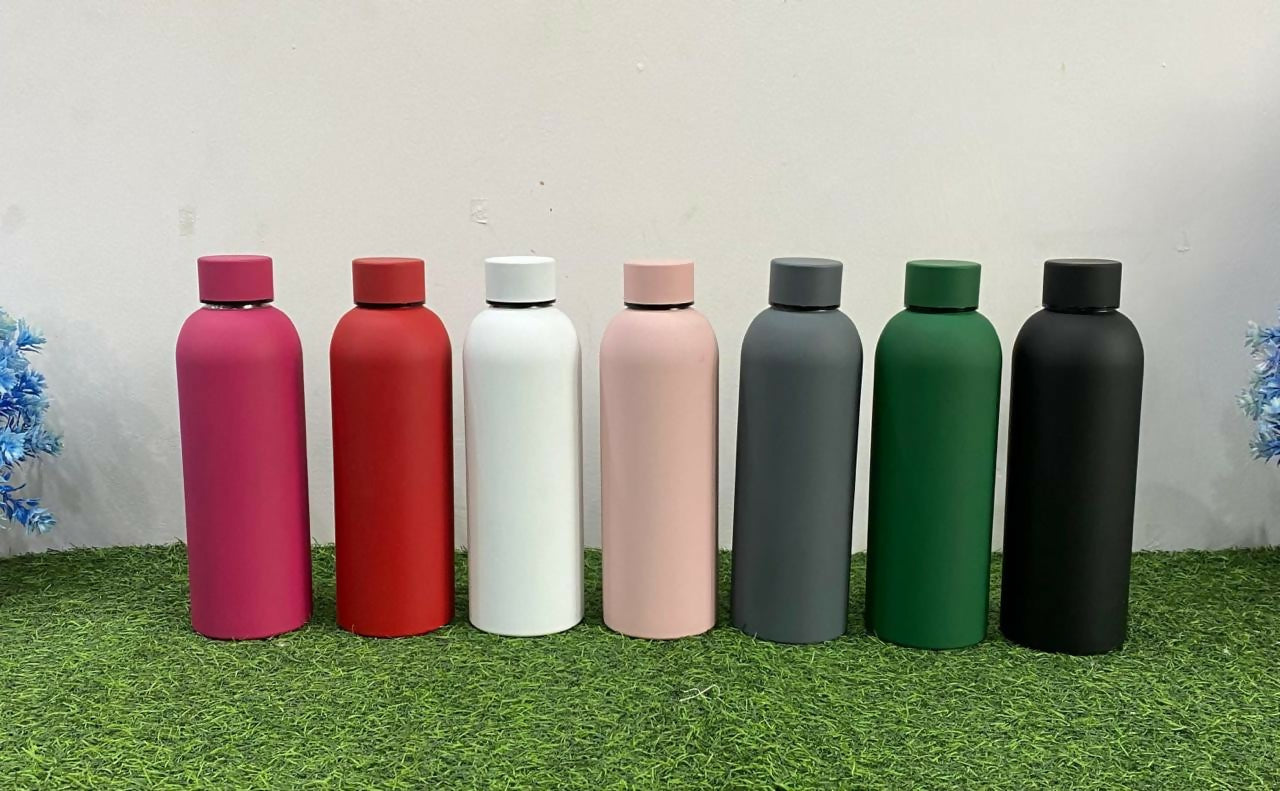 Colorful water bottles with personalized names