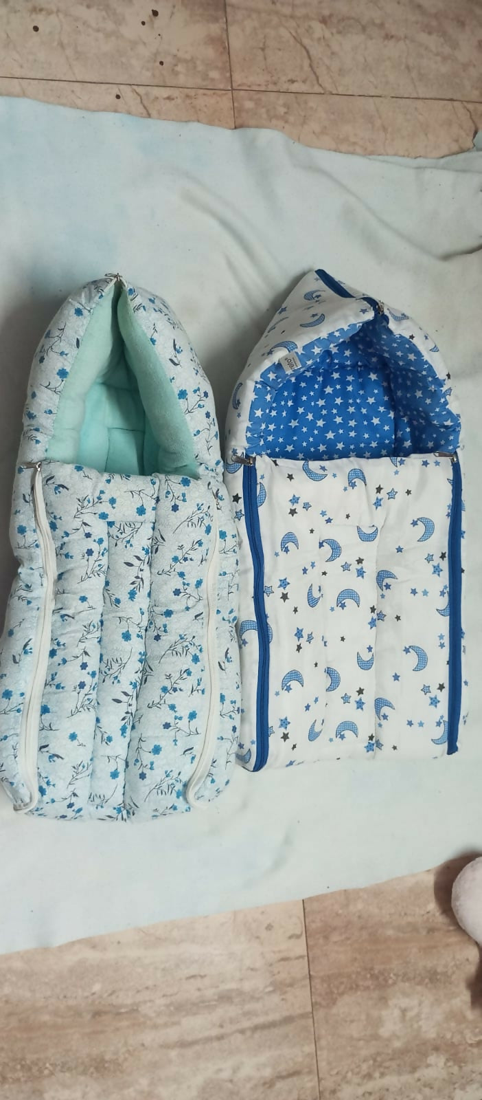 3-in-1 baby wrapper, sleeping sack, and carrier – a cozy sleeping pod for newborns.