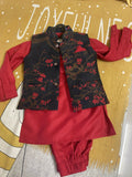 Red outfit with black floral vest