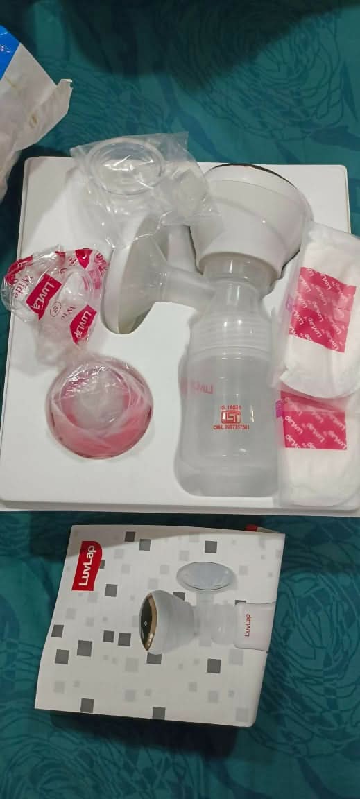 Enhance your breastfeeding experience with the LUVLAP Elite Electric Breast Pump – featuring customizable suction levels, a soft silicone massage cushion, and a portable design for efficient and comfortable milk expression.