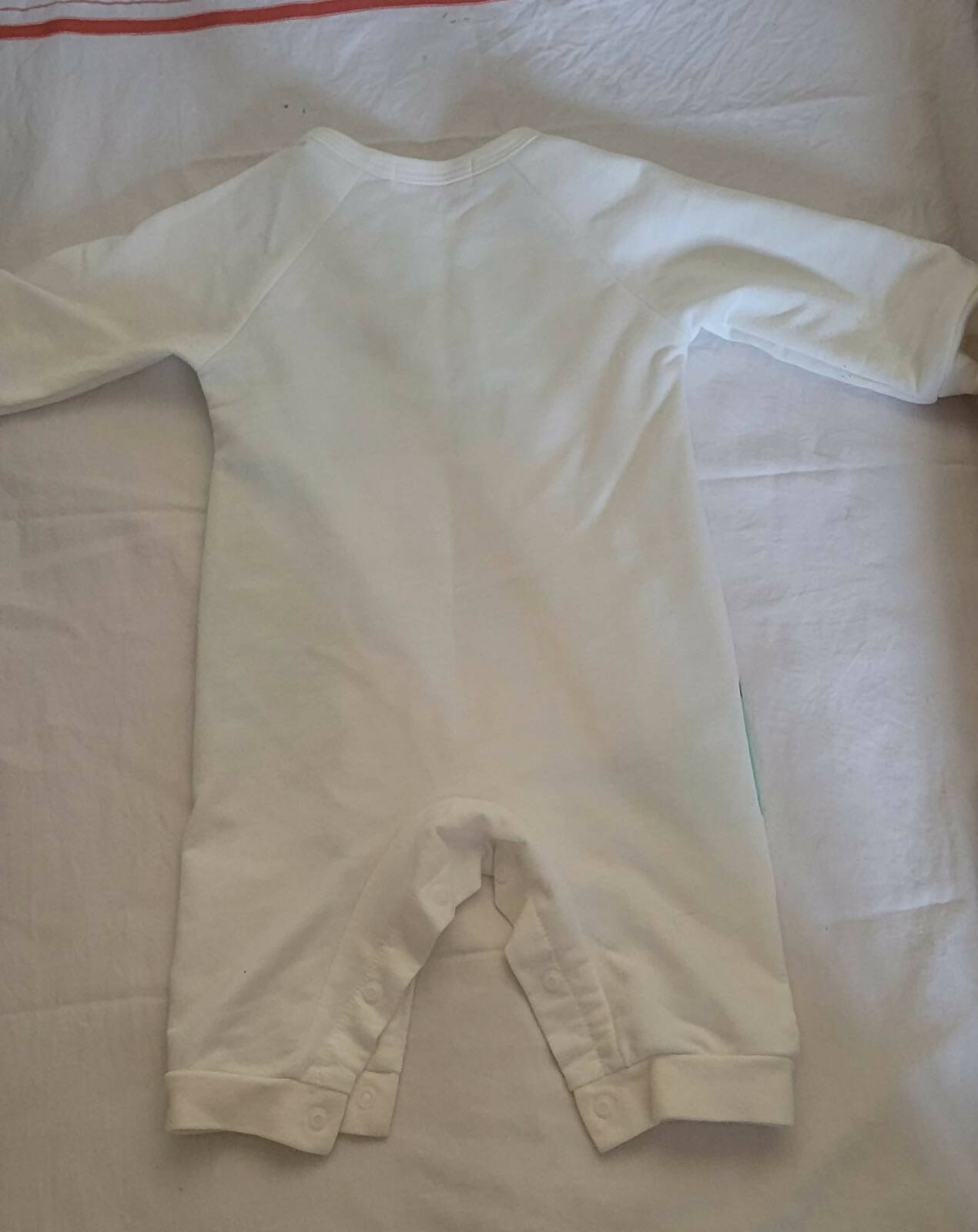 Keep your baby comfy and cute with the HOPSCOTCH Bodysuit - the perfect essential for everyday wear!