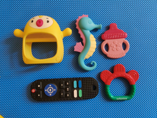 Soothe your baby’s teething discomfort with this Set of 4 Teethers—safe, colorful, and designed for tiny hands to grip and chew!