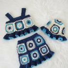 Crocheted baby outfit with dress and hat 