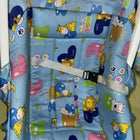 Children's seat with cartoon animal patterns on a blue background