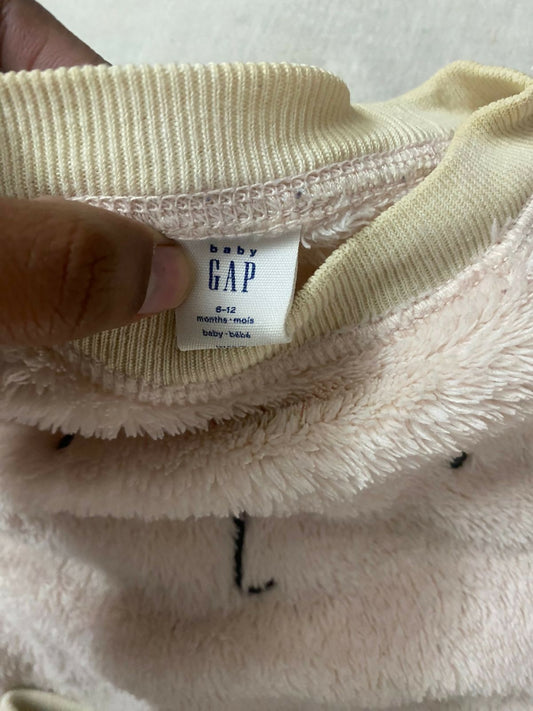 Keep your baby warm in style with the GAP Woollen Top and Bottom set, offering premium comfort and winter-ready fashion.