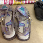 Pair of children's sandals with butterfly design