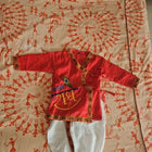 Explore the Cotton Radhe Krishna Dhoti Kurta, offering soft, breathable fabric and traditional style with intricate embroidery, perfect for festive and cultural occasions.
