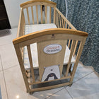 BabyTeddy® 16-in-1 original patented baby crib with convertible cot, toddler bed, cradle rocker, study desk, kids' sofa mode, mosquito net, soft mattress, and diaper changing station for newborns and growing children.