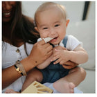 Sterilised Mushie Baby Finger Toothbrush set—gentle, BPA-free silicone brushes for oral hygiene and teething relief.